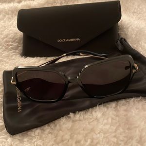 Dolce and Gabbana DG 6157 Black and gold sunglasses with gray gradient lens.